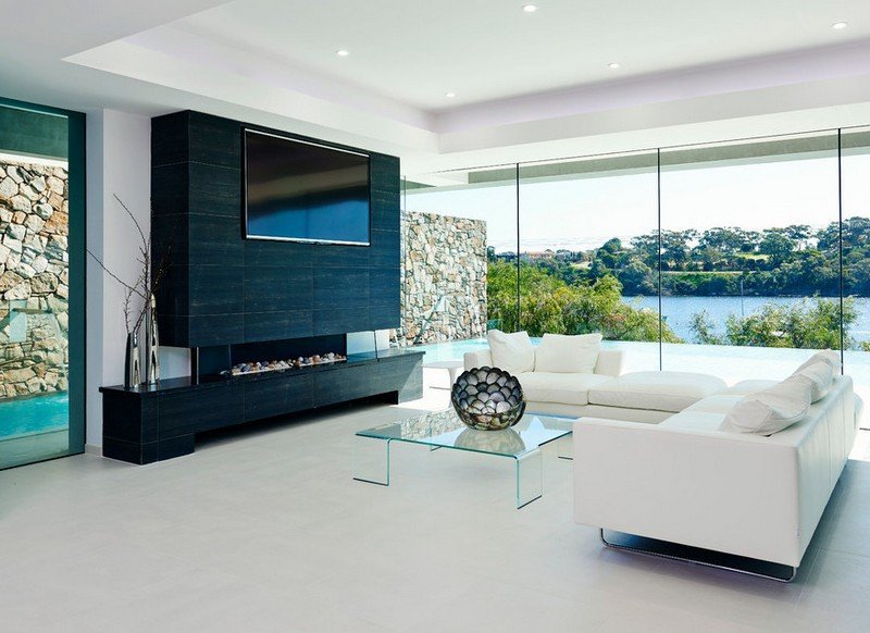 Mobilă-cameră-șemineu-canapea-colț-covor-alb-granit