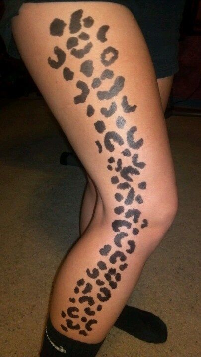 Tatuaggio ghepardo sulla gamba per le donne