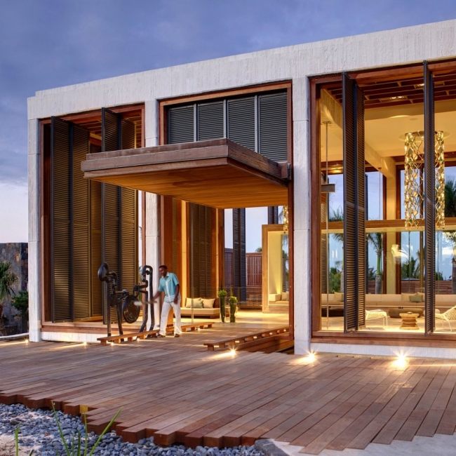 Mauritius-Plajă lungă-hotel de lux-clădire cu acoperiș plat-față din sticlă din podea până în tavan Terasă din lemn pe plajă lungă - hotel de lux - clădire pe acoperiș plat - față din sticlă din podea până în tavan