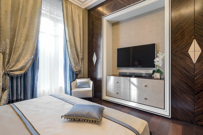 Dormitorul de lux are lambriuri din lemn apartament dormitor design perete nișă tv dulap dulap