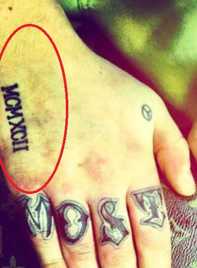 Tatuaggio con numeri romani Mac-Miller