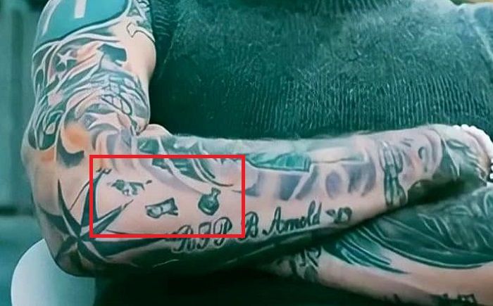 Mitrailleuse kelly-bras-tatouage