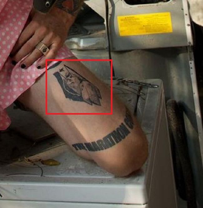 tatouage cuisse gauche de mitrailleuse kelly