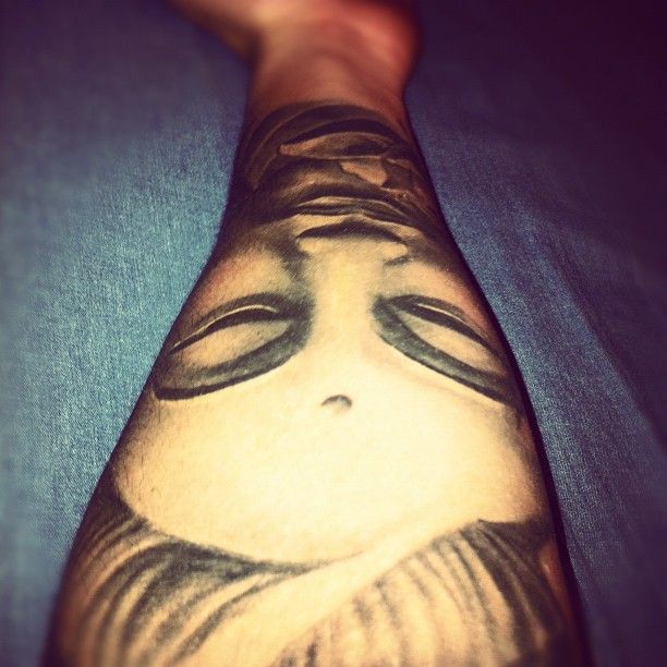 Budha-maluma tatuaggio