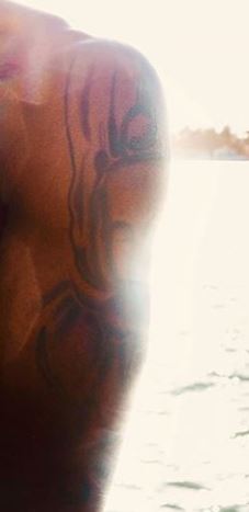 Moise左腕二頭筋タトゥー