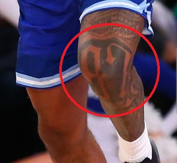 Myles Powell kairioji koja 97 tatuiruotė