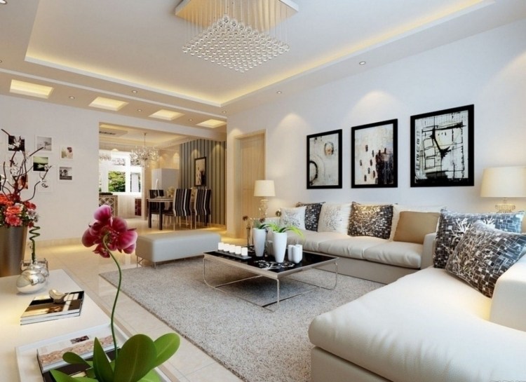 design modern în sufragerie conform Feng Shui feng-shui-living-mobilier-de-colt-alb-canapea-covor-flori-orhidee-tablou-de-masuta-de-cafea