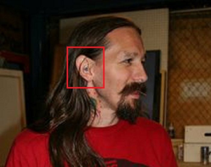 OLiver Peck-Ear Tattoo