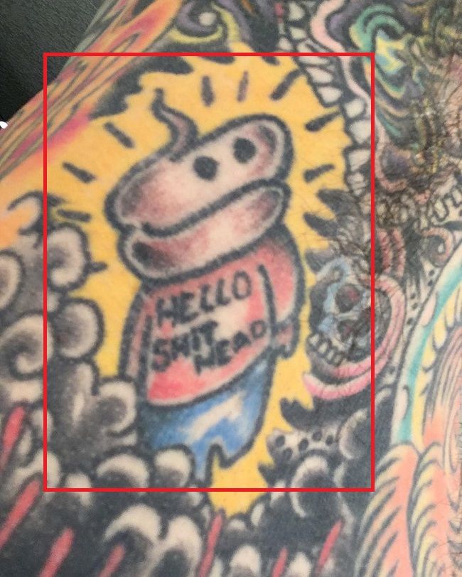 bonjour merde tête-oliver peck-tatouage