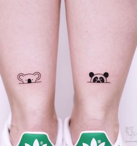 panda pusės galvos tatuiruotė