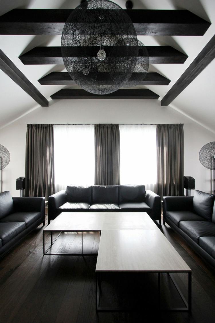 Ideea de design - zona de relaxare a penthouse-ului cu o măsuță de cafea în formă de L zonă de relaxare sufragerie design masă de cafea perdele albe fereastră