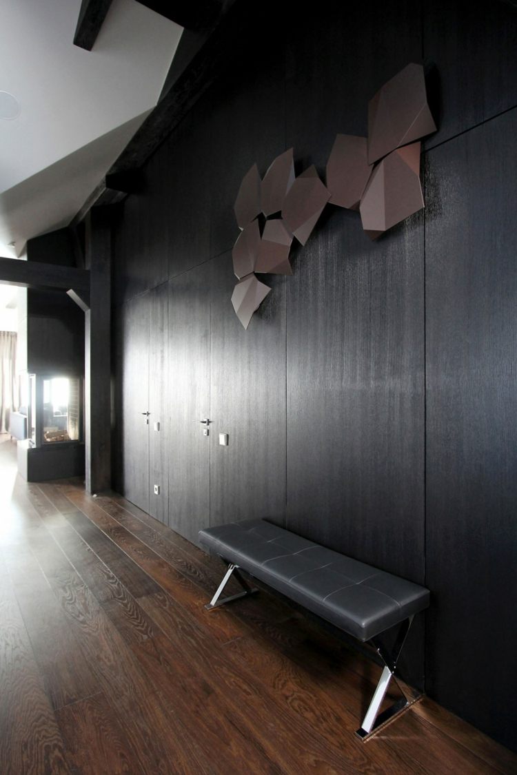 Designul holului este format, printre altele, de o placare de perete din lemn hol penthouse design bancă opera de artă lampă originală