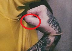 Rubino trijų taškų tatuiruotė