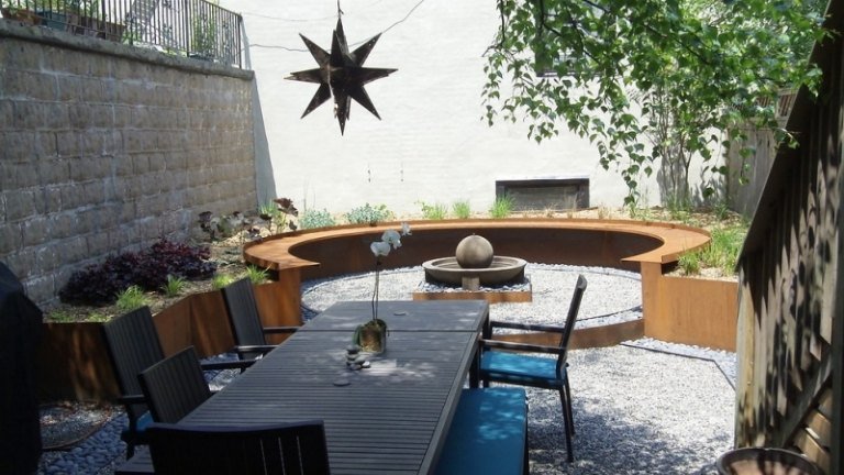 Locuri în grădină cu o fațadă semicirculară din oțel Corten Scaun-în-grădina-idei-moderne-bancă din oțel Corten