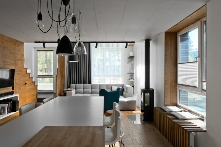 Accente gri și albe în zona de zi în plan deschis stil scandinav gri bucătărie deschisă design interior luminos
