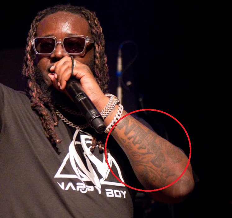 T Pain braço esquerdo Fralda Boy Tattoo.jpg