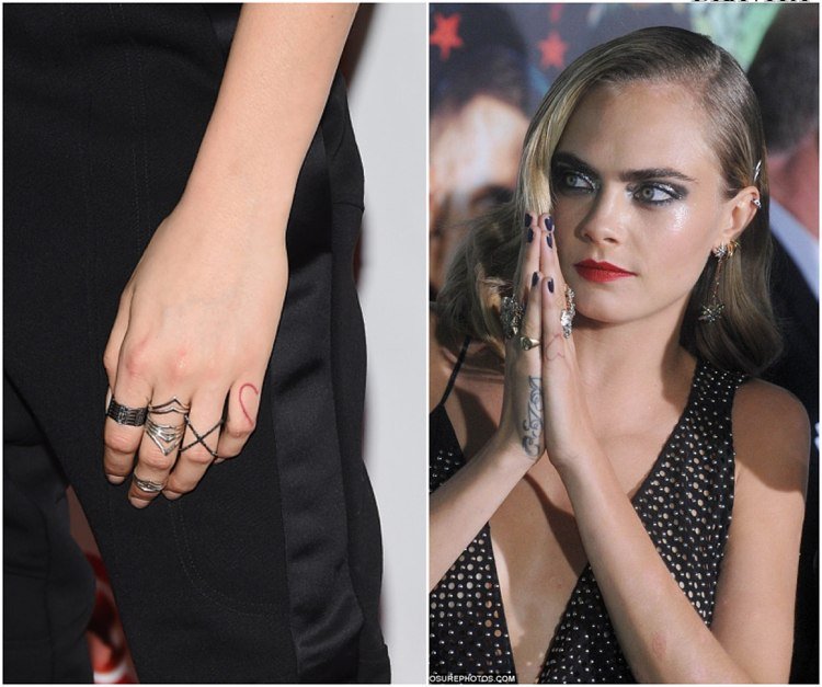 Tatuaj cu degetul inimă cu cerneală roșie Cara Delevigne Tattoo Trends 2018