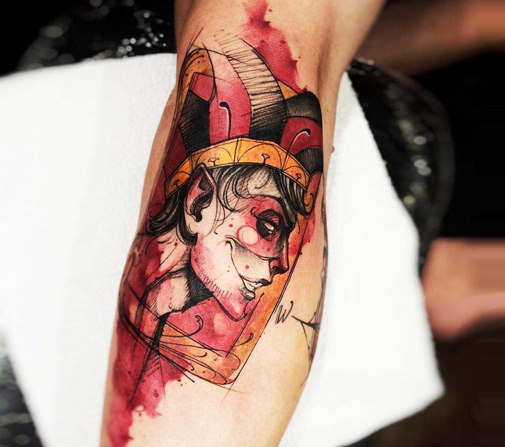 Idei de design pentru tatuaje cu carduri Joker motive de tatuaj pentru brațul superior și semnificația acestora