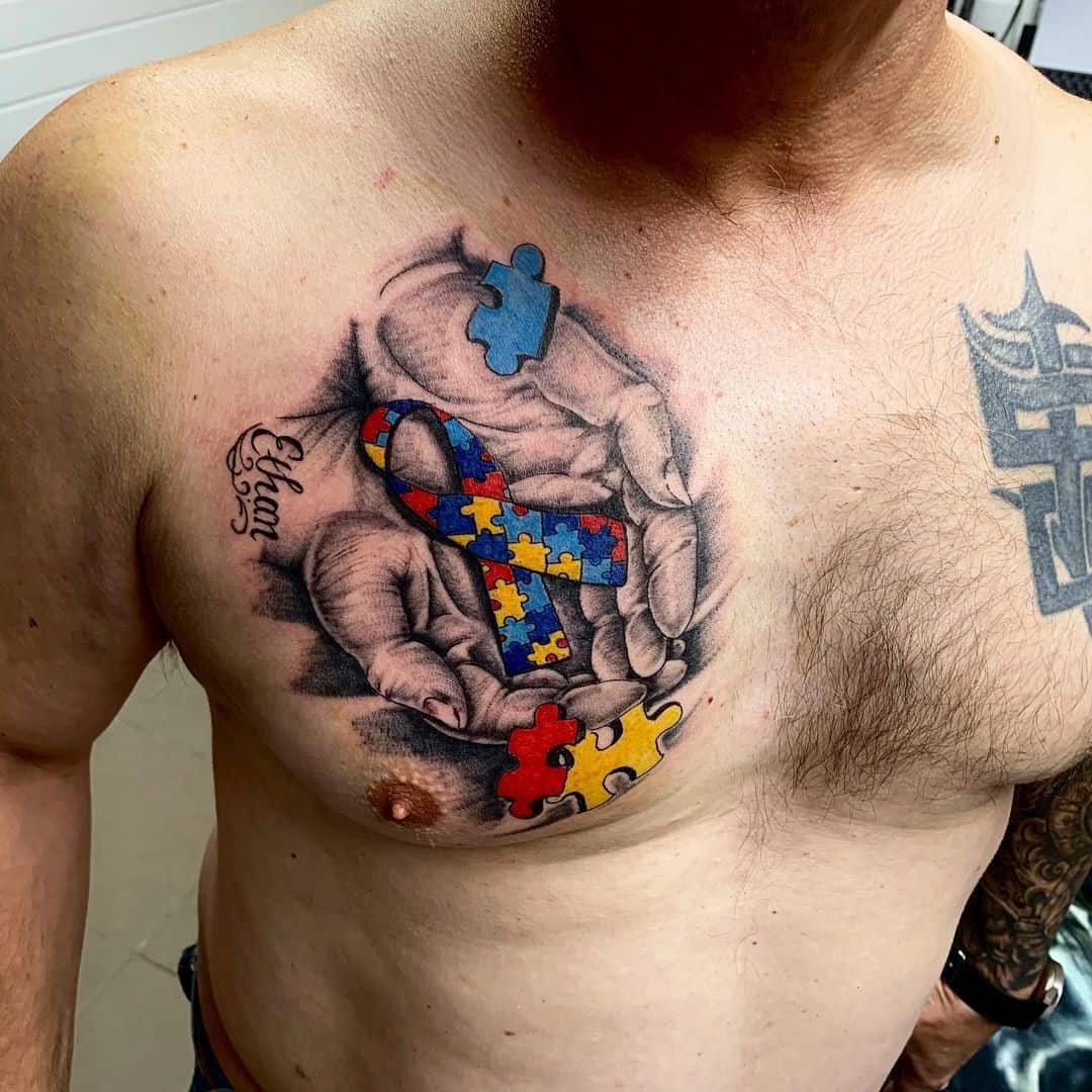 Sentimentali galvosūkio dėlionė, autizmo tatuiruotė