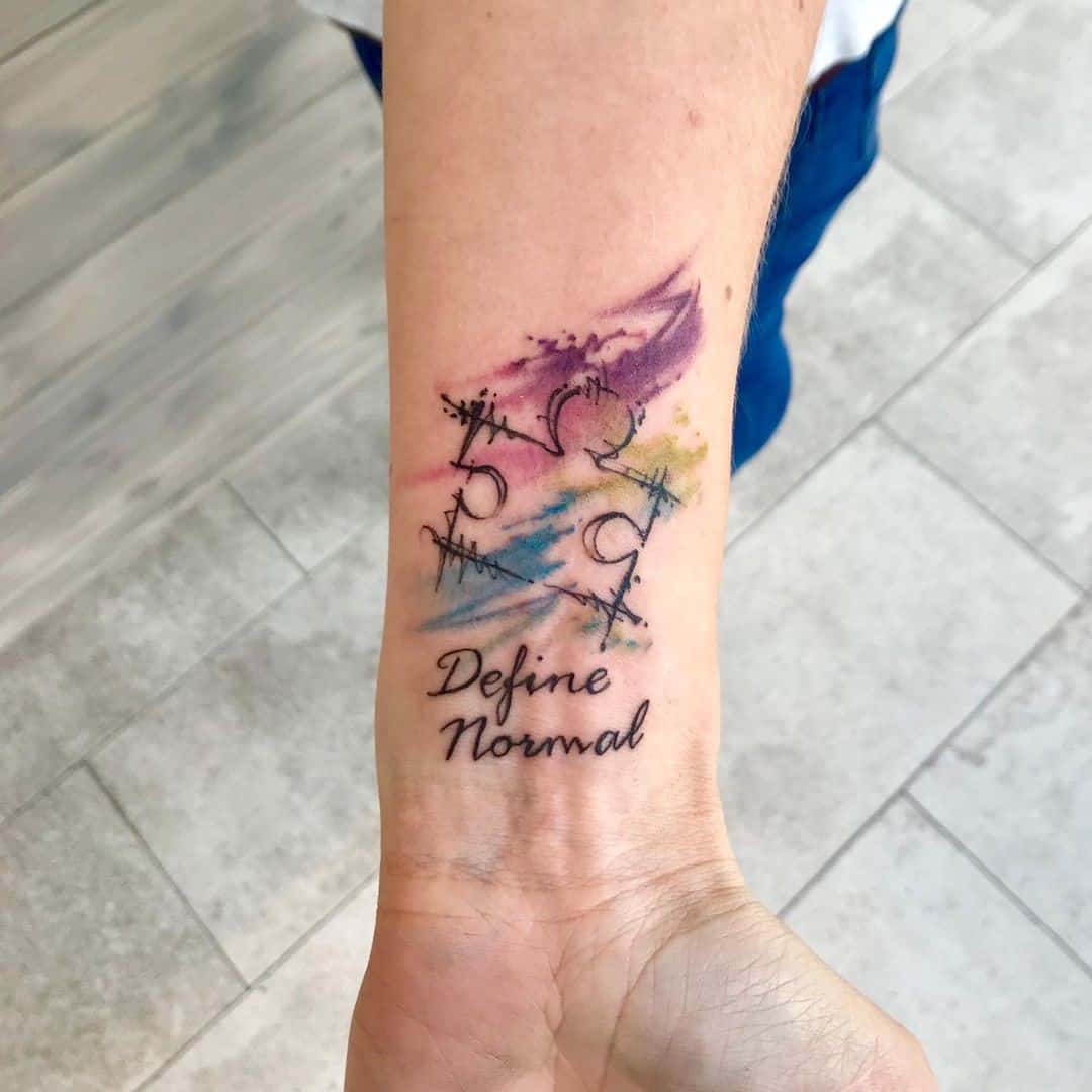 Apibrėžkite įprastą autizmo tatuiruotę