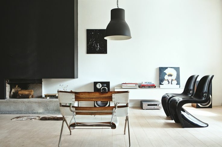 Pentru a trăi în stilul Bauhaus, puteți folosi Pantonchair în orice culoare living-bauhaus-stil-pantonchair-negru-plastic-mobilier-idee-șemineu-perete-negru-accent
